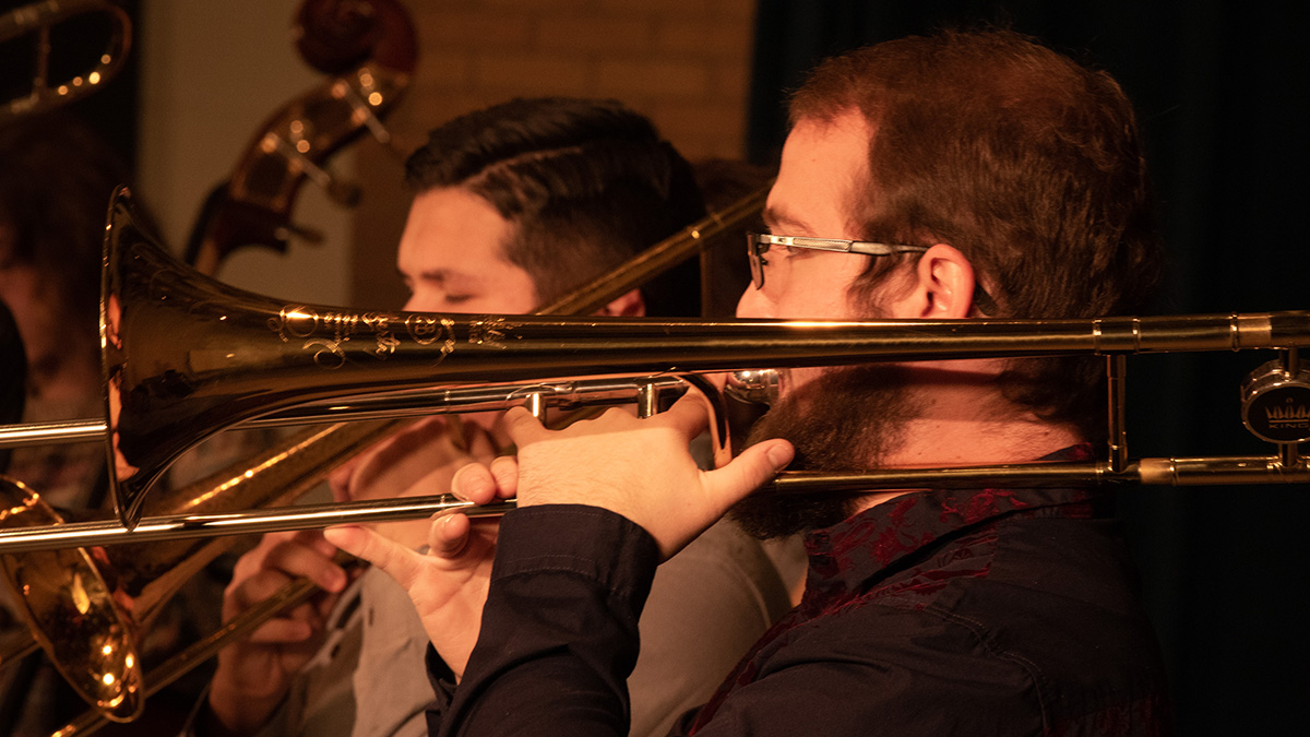 Close up shot of Jazz trombonists performing